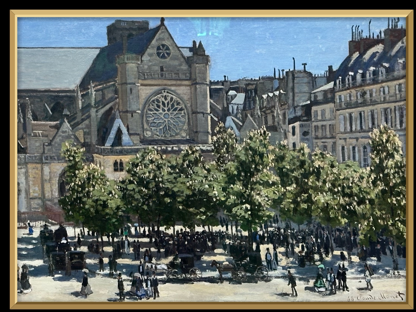 A painting by Claude Monet displayed inside a gold picture frame on the iPad screen.
